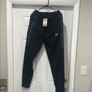 Nike Black Jogger Pants with White Swoosh